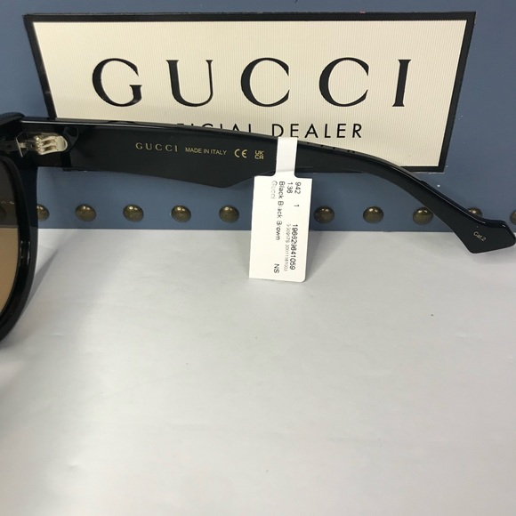 ? Authentic GUCCI GG0957S 003 cat eye Gucci sunglass black frame brown lenses. main image 7